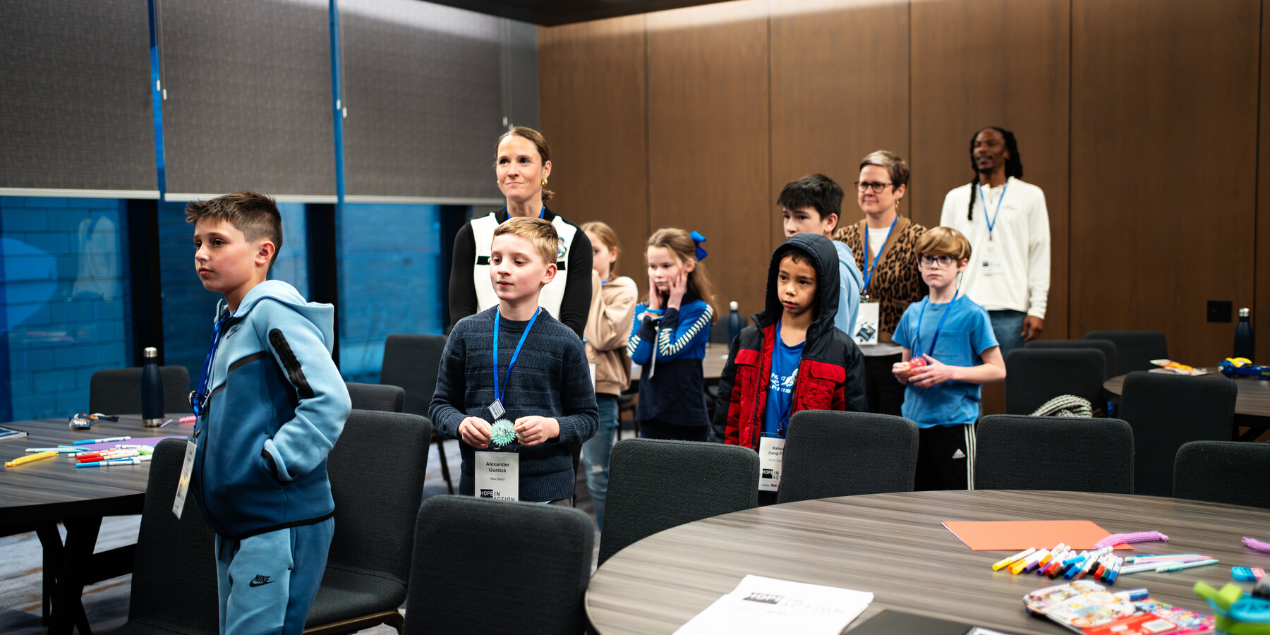 Children and families gathered in the sibling programming room at Advocacy Day